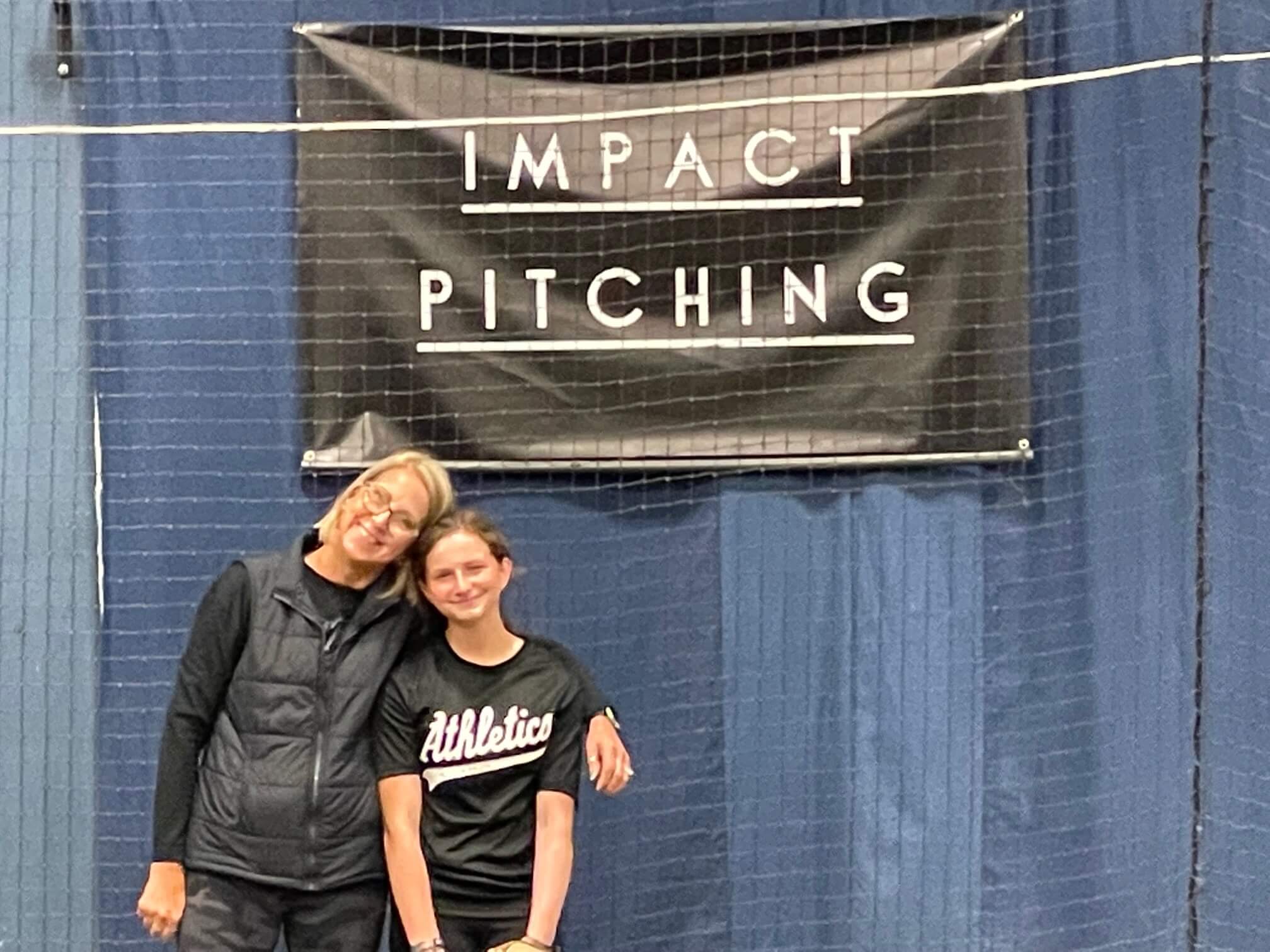 Kaylon Tauer with Denise Munro at her pitching lesson